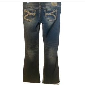 Silver Jeans Twisted Blue Jeans Bootcut Low Rise Med Wash Distressed Size 29